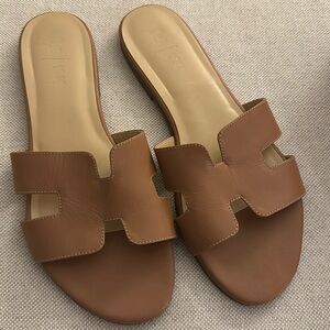 French sole nearly new tan Alibi slide sandals